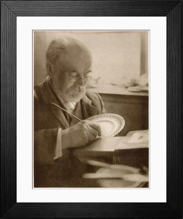 Framed Print : The gilder at work: gilding the edge of the plates. Date: 1913 Framed Print : The gilder at work: gilding the edge of the plates. Date: 1913