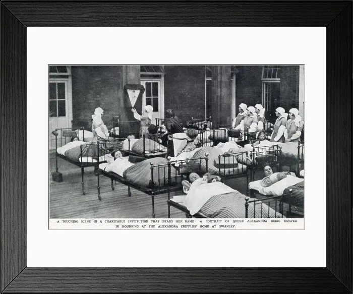 Framed Print : A touching scene in a charitable institution, showing a portrait plaque of Queen Alexandra (Queen-Mother at the time) on the wall of a children's ward in the Alexandra Hospital, Swanley named after her. Date: 1925