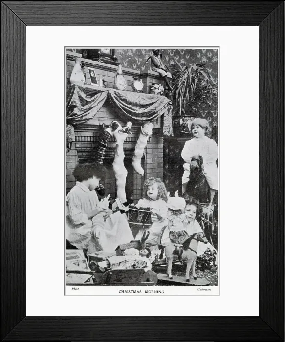 Framed Print : Wealthy children receiving their plentiful of gifts on Christmas day morning. Date: December 1906 Framed Print : Wealthy children receiving their plentiful of gifts on Christmas day morning. Date: December 1906