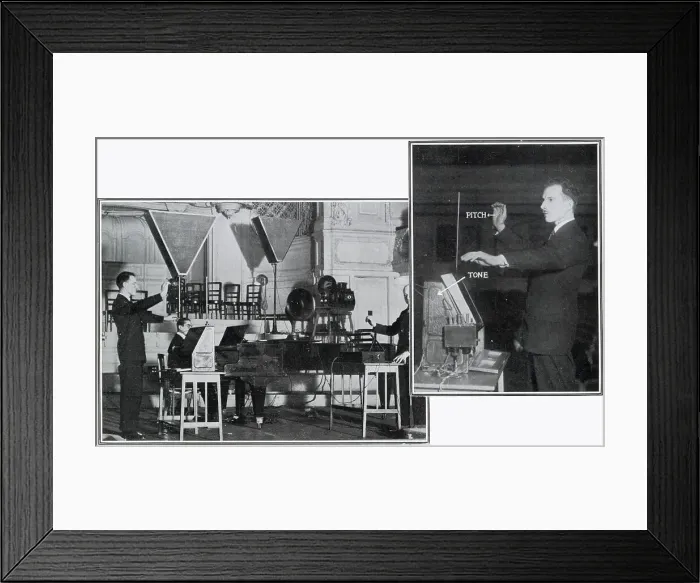 Framed Print : Leon Theremin (1896 - 1993) giving a demonstration of his electronic musical instrument to a group of invited Scientists (including Sir Oliver Lodge) at the Savoy Hotel and at an subsequently a concert at the Albert Hall (pictured)