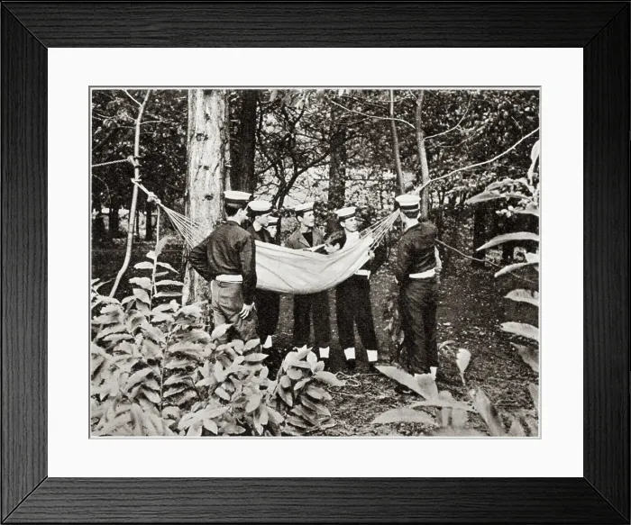 Framed Print : Members of the Naval section of Wellington College's cadet force learning how to sling a hammock in contrasting surroundings. Date: 1959 Framed Print : Members of the Naval section of Wellington College's cadet force learning how to sling a hammock in contrasting surroundings. Date: 1959