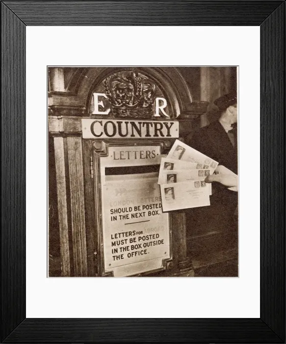 Framed Print : Some of the first letters to bear the stamps of the new reign of Queen Elizabeth II being posted at the General Post Office in London, just after midnight on December 5 1952, in special envelopes. Date: 1952