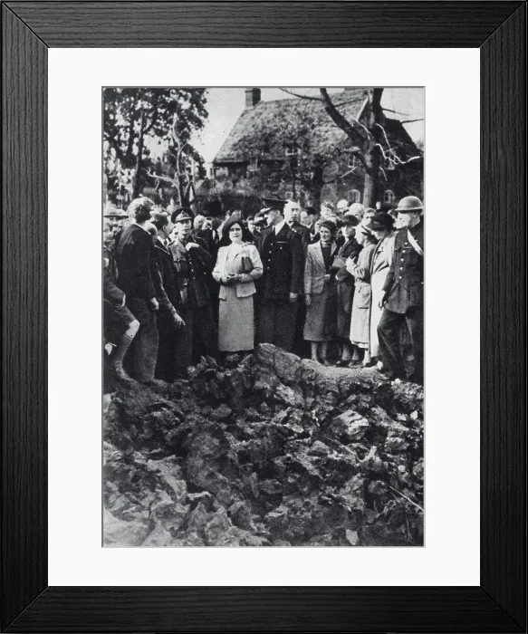 Framed Print : King George VI and Queen Elizabeth watching an air battle while visiting bombed areas in London. They are standing on the edge of a large crater. Date: 27th September 1940 Framed Print : King George VI and Queen Elizabeth watching an air battle while visiting bombed areas in London. They are standing on the edge of a large crater. Date: 27th September 1940