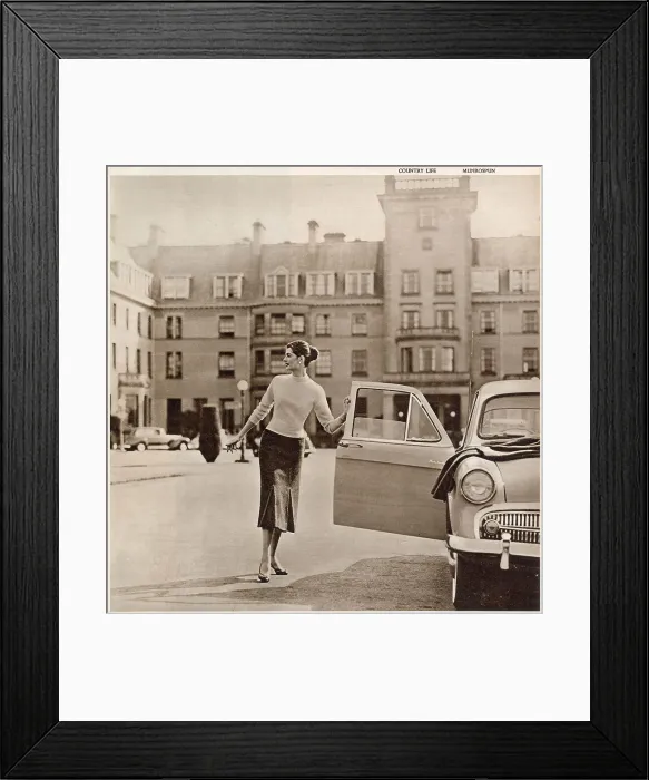 Framed Print : The Gleneagles Hotel - A glamorous model in trendy knitwear at the front of the hotel getting into her car. Date: 1956 Framed Print : The Gleneagles Hotel - A glamorous model in trendy knitwear at the front of the hotel getting into her car. Date: 1956