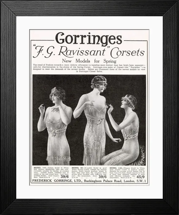 Framed Print : Three models wearing spring dainty lace corsets. Date: 1922 Framed Print : Three models wearing spring dainty lace corsets. Date: 1922