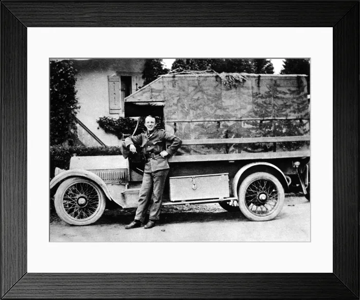 Framed Print : Camoflagued ambulance