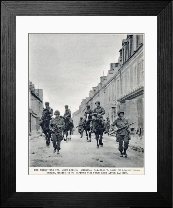 Framed Print : The entry of American paratroops into St. Mere Eglise, Normandy, shortly after D-Day Framed Print : The entry of American paratroops into St. Mere Eglise, Normandy, shortly after D-Day