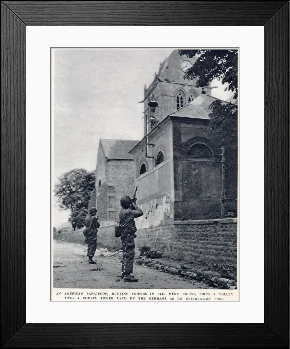 Framed Print : American paratroop, hunting snipers in St. Mere Eglise, firing a volley into a church Framed Print : American paratroop, hunting snipers in St. Mere Eglise, firing a volley into a church