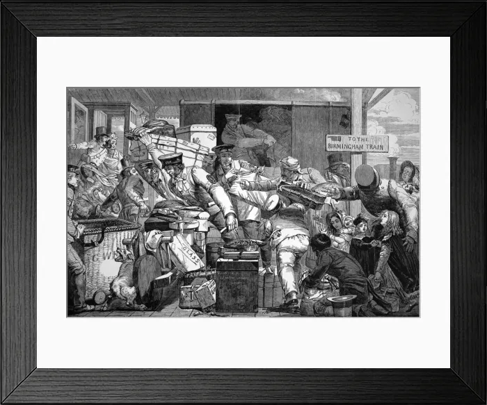 Framed Print : Luggage being moved onto a narrow train Framed Print : Luggage being moved onto a narrow train