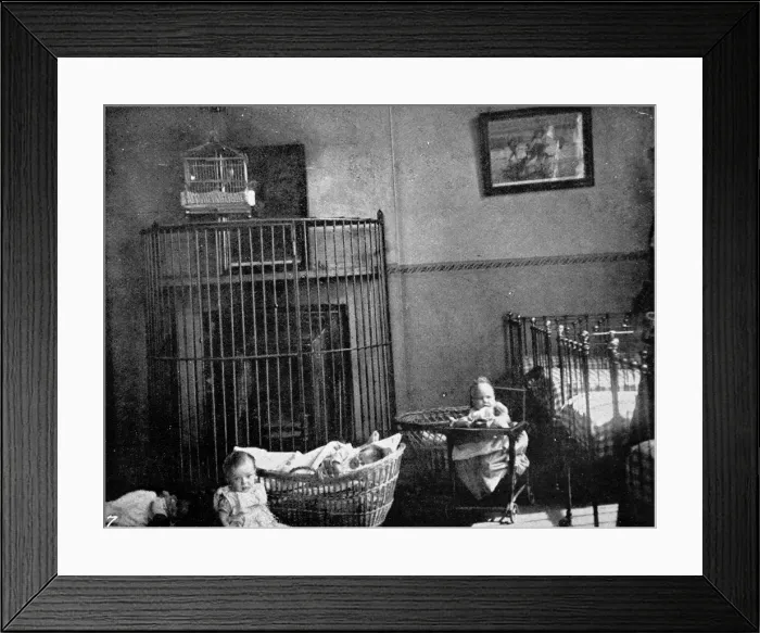 Framed Print : Prison babies in chairs and cots in the day nursery Framed Print : Prison babies in chairs and cots in the day nursery