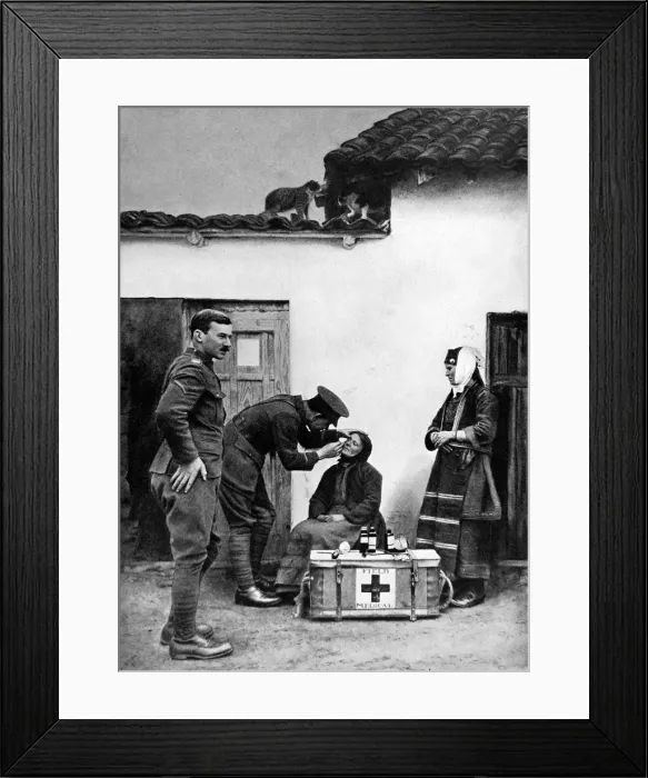 Framed Print : A British doctor attending to a Macedonian villager