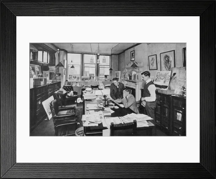 Framed Print : In the editors room: a special artists drawing is brought Framed Print : In the editors room: a special artists drawing is brought