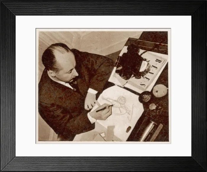 Framed Print : Christian Dior sketching a fashion design, 1948 Framed Print : Christian Dior sketching a fashion design, 1948