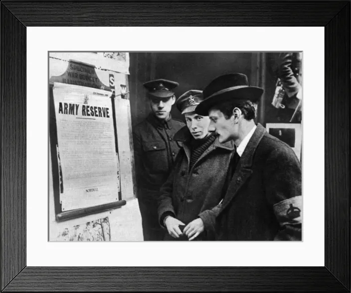 Framed Print : Potential army recruit looks at the proclamation Framed Print : Potential army recruit looks at the proclamation