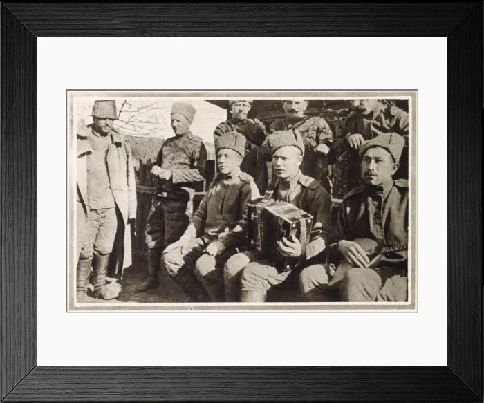 Framed Print : A group of Russian soldiers in camp accompanied by their musical instruments