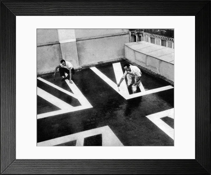 Framed Print : Painting the Embassy roof with a Union Flag, Madrid; Spanish Framed Print : Painting the Embassy roof with a Union Flag, Madrid; Spanish