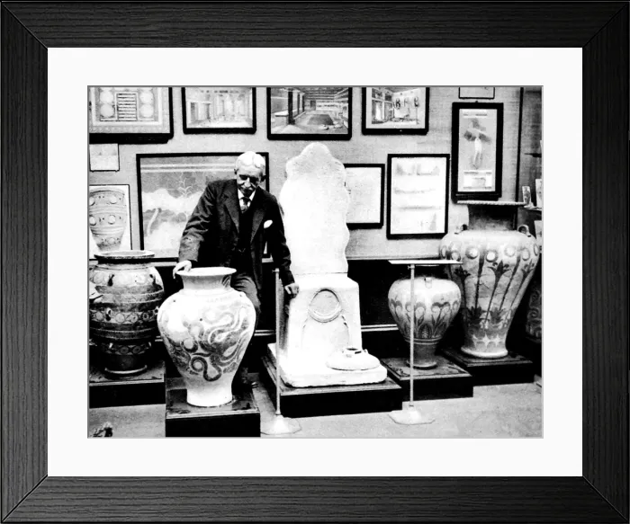 Framed Print : Sir Arthur Evans arranging exhibits, Burlington House, Londo