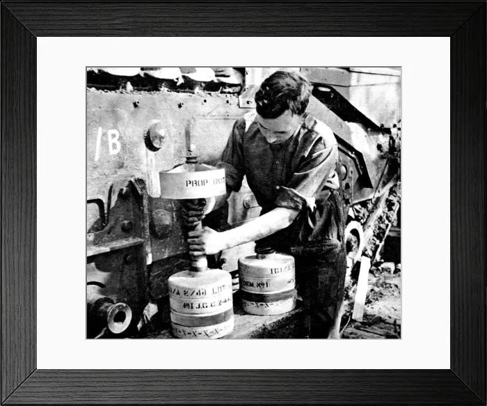 Framed Print : Royal Engineer adjusting a Flying Dustbin charge; Second W