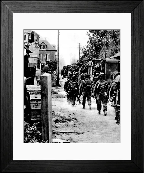 Framed Print : Allied Troops moving through a French village; Second World Framed Print : Allied Troops moving through a French village; Second World