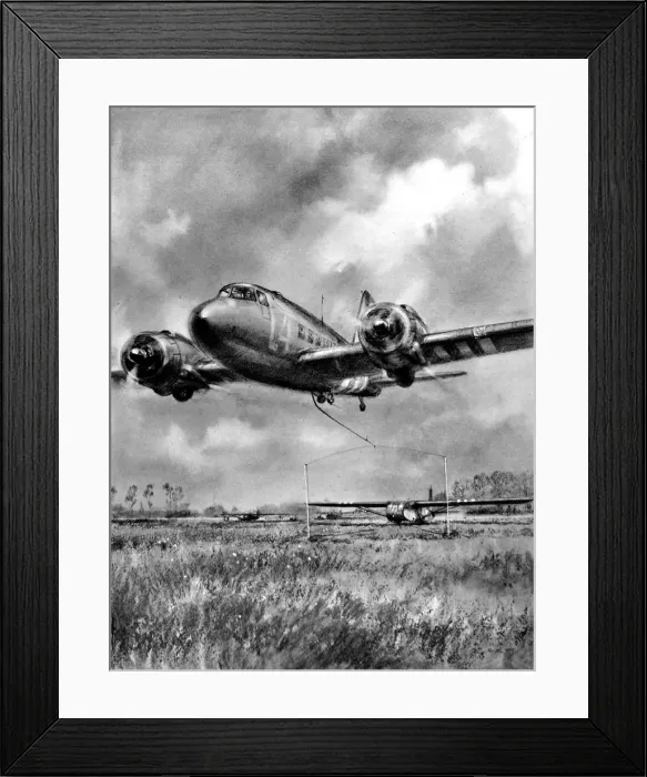 Framed Print : Douglas Dakota picking up a glider, Normandy; Second World W Framed Print : Douglas Dakota picking up a glider, Normandy; Second World W