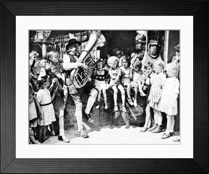 Framed Print : Children listening to a tuba player, Berlin, 1945