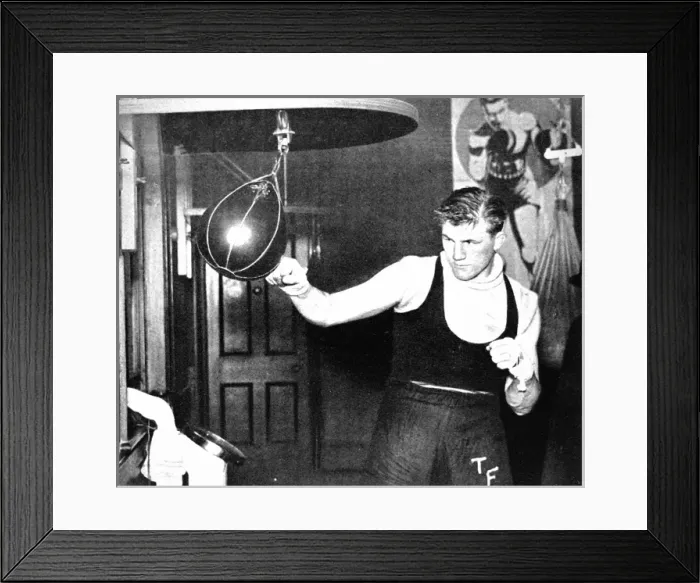 Framed Print : Tommy Farr using a punch ball, 1937 Framed Print : Tommy Farr using a punch ball, 1937