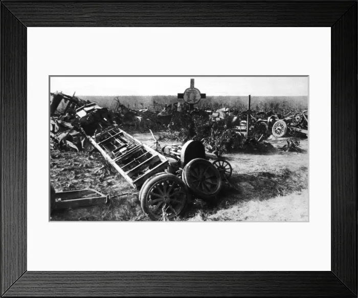 Framed Print : The remains off a German motor-transport convoy grouped round soldiers graves