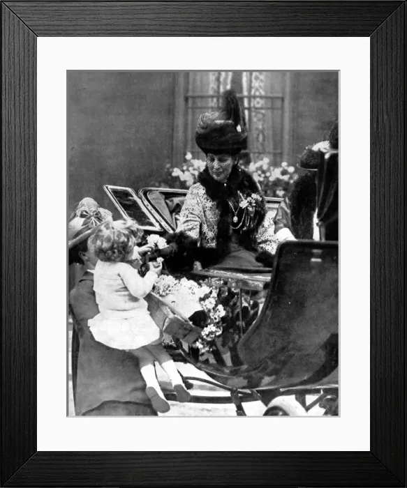Framed Print : Queen Alexandra receiving a rose from a child, London, 1925 Framed Print : Queen Alexandra receiving a rose from a child, London, 1925