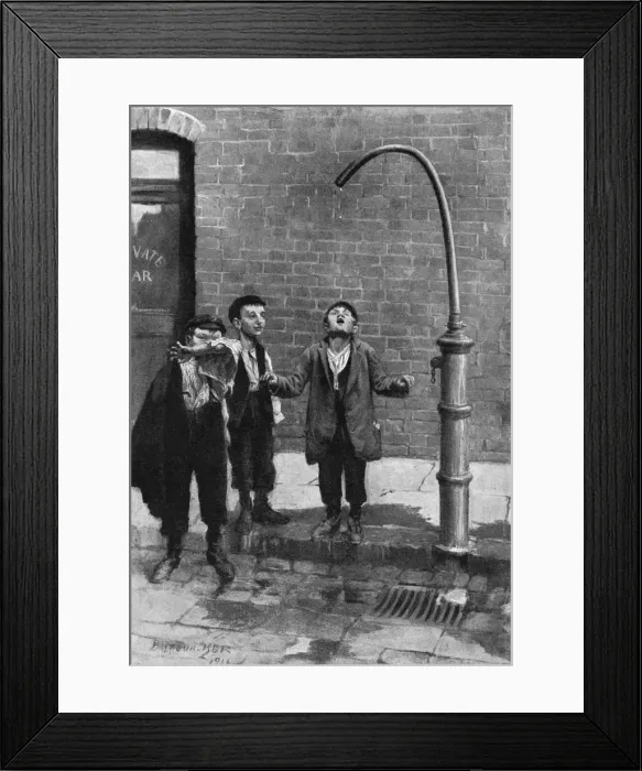 Framed Print : Young boys quench their thirst at a water tap Framed Print : Young boys quench their thirst at a water tap