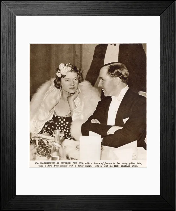 Framed Print : Marchioness of Dufferin and Ava talking the the Hon. Charles Winn at the Primrose League Ball. Date: 1936