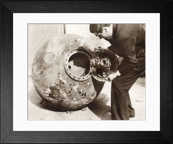 Framed Print : A Basque soldier taking apart a Nationalist mine (sea mine) in Bilbao, during the Spanish Civil War. The mine had been laid in the sealanes off Bilbao, from where it was swept up by a Basque minesweeper and disarmed. Date: 1937 Framed Print : A Basque soldier taking apart a Nationalist mine (sea mine) in Bilbao, during the Spanish Civil War. The mine had been laid in the sealanes off Bilbao, from where it was swept up by a Basque minesweeper and disarmed. Date: 1937