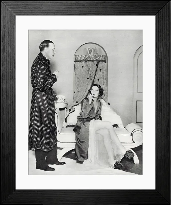Framed Print : Photograph showing Noel Coward (1899-1973) and Gertrude Lawrence (1898-1952) starring in Coward's repertory Tonight at Seven Thirty, which included the piece Shadow Play, Manchester, 1935. Date: 1935 Framed Print : Photograph showing Noel Coward (1899-1973) and Gertrude Lawrence (1898-1952) starring in Coward's repertory Tonight at Seven Thirty, which included the piece Shadow Play, Manchester, 1935. Date: 1935