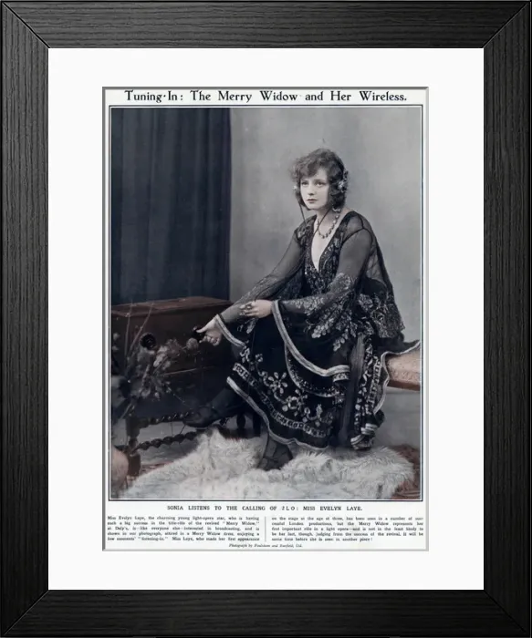 Framed Print : Evelyn Laye listening to music in 1923