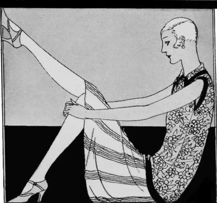 Framed Print : 1920s woman admiring her shoes