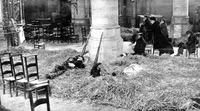 Framed Print : Belgian soldiers sleep in a church while women and civilians pray for their countrs liberation