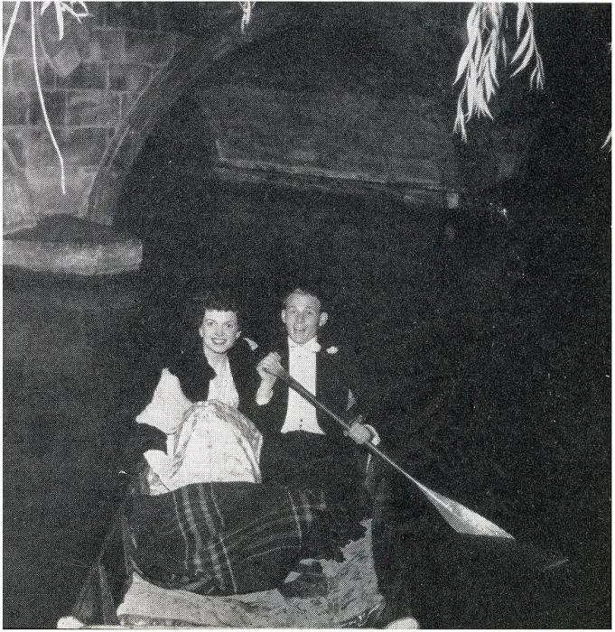 Framed Print : Belinda Stobart and Mr D. K. Wilson out on the river during the May Ball, held by 1st and 3rd Trinity Boat Club at Trinity College. Dancing was on the loggia and in the gardens, while the river was lit by fairy lights. Date: 1956