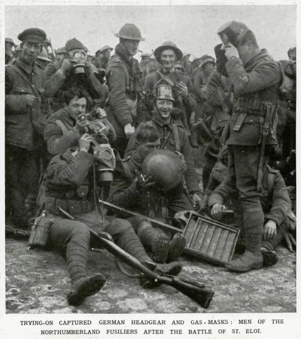 Framed Print : British soldiers trying on captured German headgear 1916