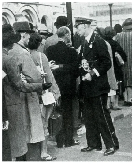 Framed Print : Bus conductor collecting fares from queuers, September 1939 Framed Print : Bus conductor collecting fares from queuers, September 1939