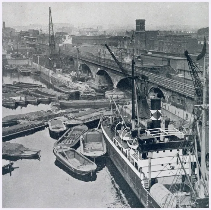 Framed Print : East London and Regents Canal Dock in Limehouse, showing barges waiting for access to Framed Print : East London and Regents Canal Dock in Limehouse, showing barges waiting for access to