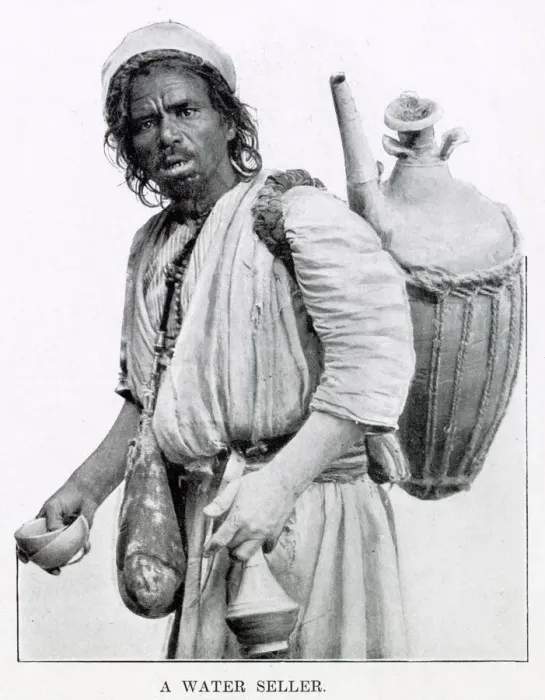 Framed Print : Egyptian man selling water from a clay jug on his back in Cairo, Egypt