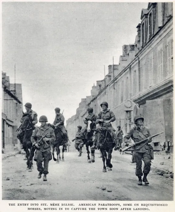 Framed Print : The entry of American paratroops into St. Mere Eglise, Normandy, shortly after D-Day Framed Print : The entry of American paratroops into St. Mere Eglise, Normandy, shortly after D-Day