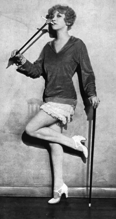 Framed Print : Frances Day with an unusual cigarette holder