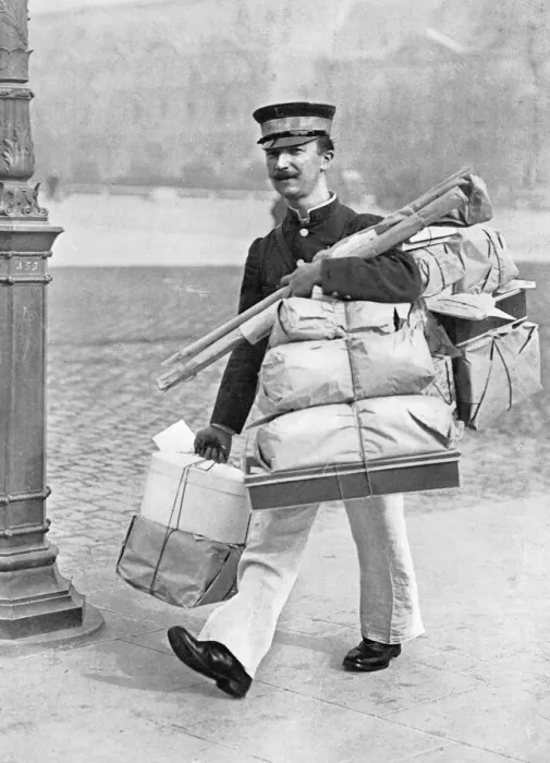 Framed Print : French parcel delivery man at Christmas, 1913