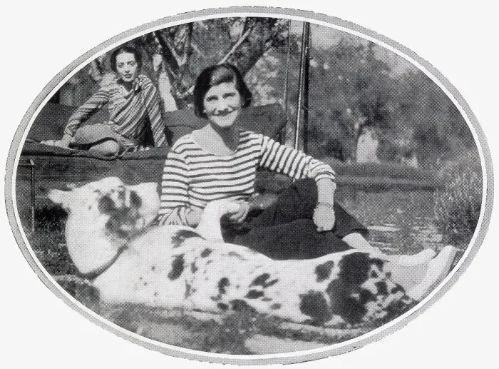 Framed Print : Gabrielle Coco Chanel pictured at her villa, La Pausa, at Roquebrune, Cap Martin on the French Riviera in the company of Baroness de Reuter, and her large dog, Gigot. Date: 1932 Framed Print : Gabrielle Coco Chanel pictured at her villa, La Pausa, at Roquebrune, Cap Martin on the French Riviera in the company of Baroness de Reuter, and her large dog, Gigot. Date: 1932
