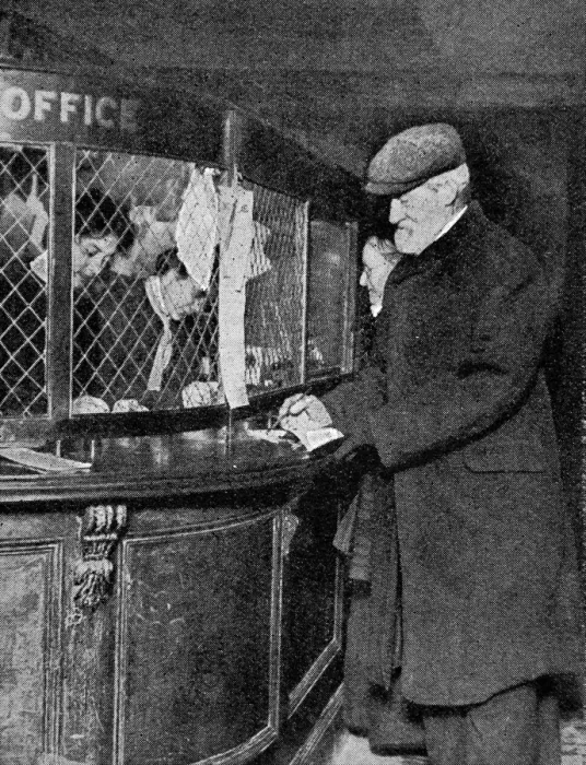 Framed Print : A gentleman drawing the first pension Framed Print : A gentleman drawing the first pension