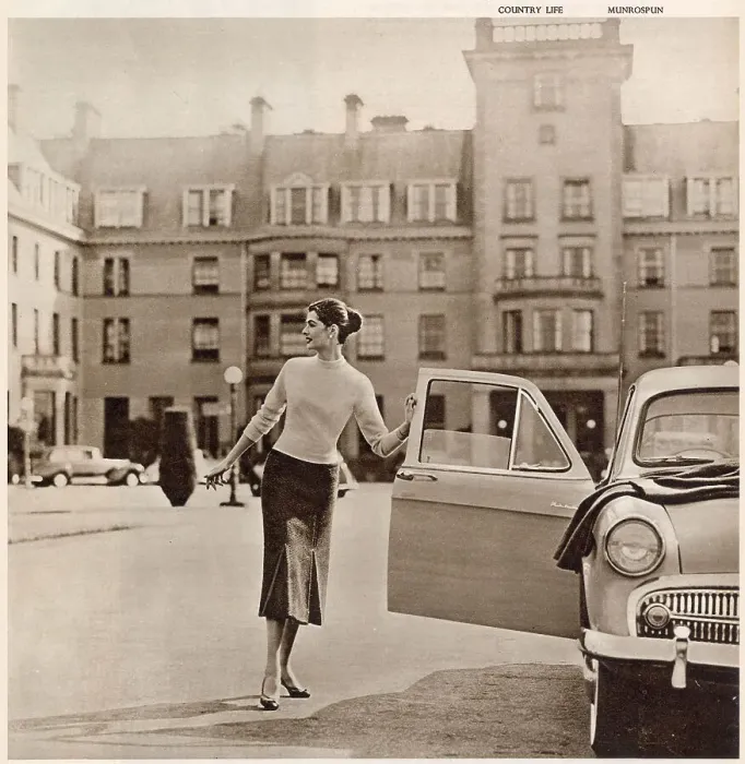 Framed Print : The Gleneagles Hotel - A glamorous model in trendy knitwear at the front of the hotel getting into her car. Date: 1956 Framed Print : The Gleneagles Hotel - A glamorous model in trendy knitwear at the front of the hotel getting into her car. Date: 1956