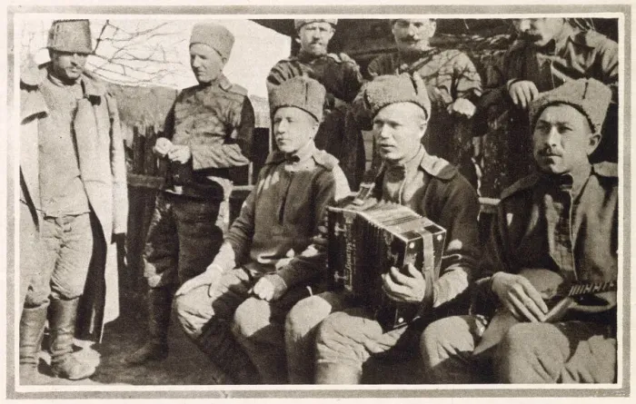 Framed Print : A group of Russian soldiers in camp accompanied by their musical instruments