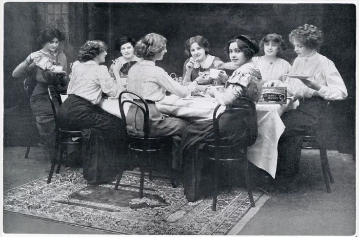 Framed Print : A group of society ladies enjoying a cup of tea and biscuits together. Date: 1910