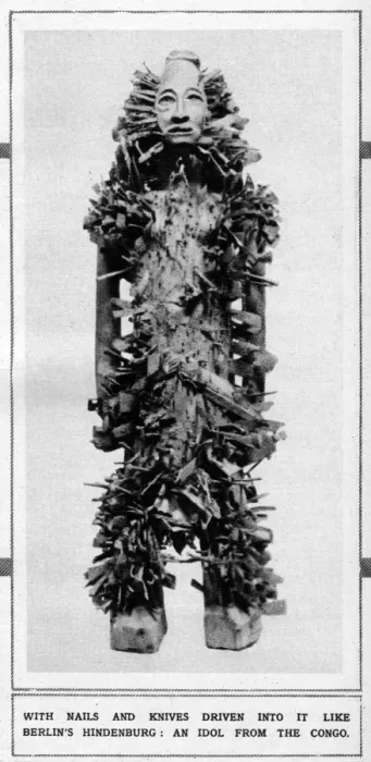 Framed Print : An idol from the Congo with nails and knives driven into it