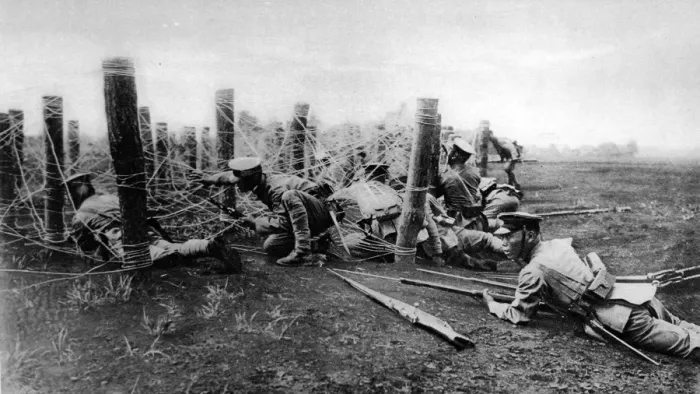 Framed Print : Japanese Infantry negotiating a wire entanglement Framed Print : Japanese Infantry negotiating a wire entanglement